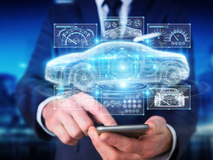 YesAuto- Businessman on blurred background modern smart car interface 3D rendering